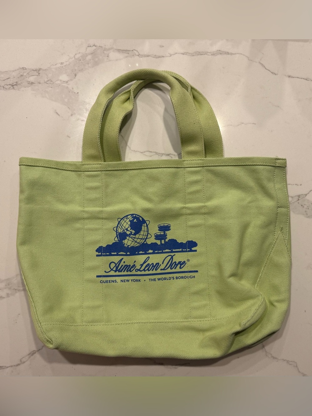 Aimé Leon Dore Small Unisphere Canvas Tote – Lime Green with Blue Logo